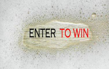 text ENTER TO WIN in the background. creates a great background for your concept .