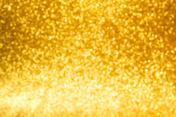 Gold round bokeh glitter lights background. blurred  festive abstract background Christmas New Year sale  Valentine's day birthday wedding party invitation