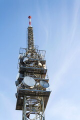 Telecommunication tower with transmitters and aerials, wireless communication and 5G broadband...