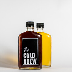 small clear bottle of cold beer