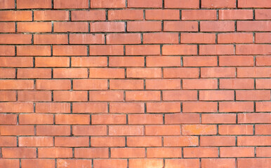 Fototapeta premium Red brick pattern, brick wall closeup look