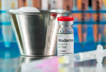 Coronavirus covid-19 experimental vaccine in a laboratory, conceptual image, fictitious experimental treatment