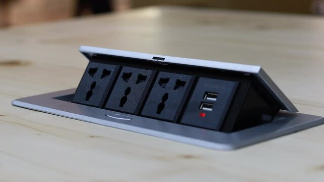 Close up young man's hand pressing button, Man's hand held the plug into the outlet And unplugging after use.