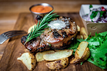 juicy steak with rosemary and potato