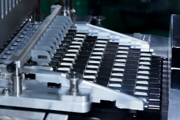 Obraz premium pharmacy medicine capsule pill in production line at medical factory. selective focus. pharmaceutical manufacturing and industry concept.