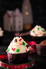 Cupcakes with vanilla cream and decorations on New Year's Eve