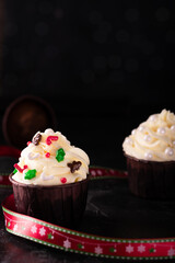 Cupcakes with vanilla cream and decorations on New Year's Eve
