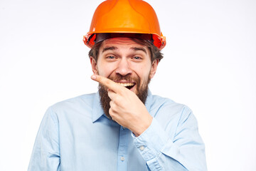 emotional man in work uniform gesturing with his hands an official construction professional