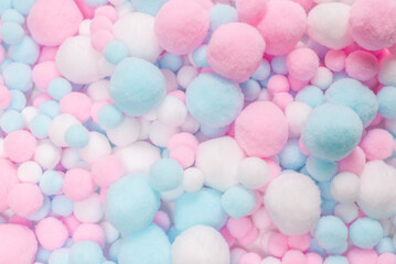 White, pink and blue soft pompons.