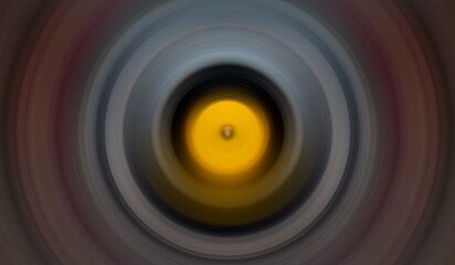 Abstract round orange background. Circles from the center point. Image of diverging circles. Rotation that creates circles.