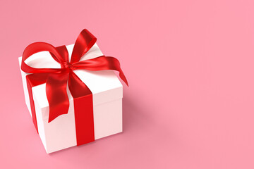 White gift box 3d with red ribbon and bow on pink background