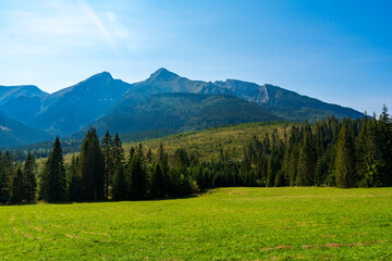 Fototapeta na wymiar Green mountains and beautiful sky clouds under the blue sky in tatras mountain in poland