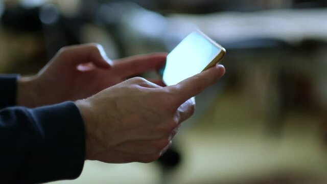 man using mobile smart phone. close up view. Slow motion footage