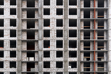 background - a wall of a building under construction