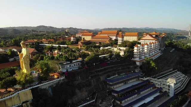 Aerial drone sunset view of Fo Guang Shan Buddha Museum in Kaohsiung, Taiwan.
Mid angle, parallax movement, HD.