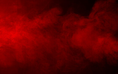 Red smoke on black background