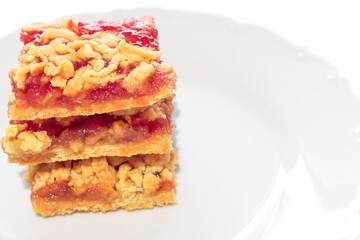 Pie with Apple jam and shortbread cakes on a white background