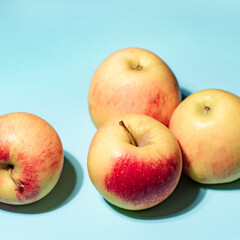 Apples on blue background art image