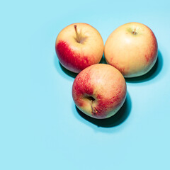 Apples on blue background art image