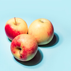 Apples on blue background art image