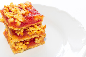 Pie with Apple jam and shortbread cakes on a white background