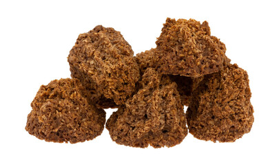 Side view of a group of gluten free chocolate macaroons isolated on a white background.