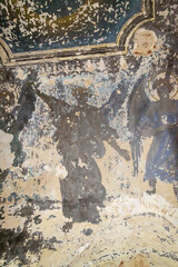 paintings on the walls of the abandoned temple of angels