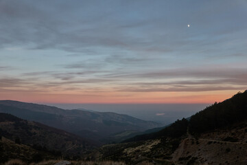 Obraz na płótnie Canvas Sunset from Puerto de la Morcuera in the Sierra de Guadarrama National Park. Madrid's community. Spain