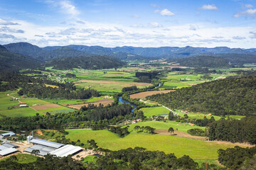 Fototapeta na wymiar Green nature landscape and blue sky in the Santa Catarina region, southern Brazil