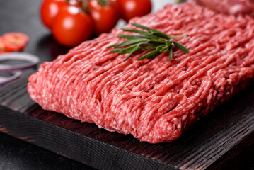 Fresh raw beef mince on a dark background