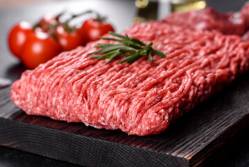 Fresh raw beef mince on a dark background