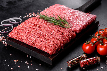 Fresh raw beef mince on a dark background