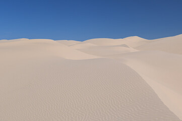Fototapeta na wymiar Sand Dunes and blue sky