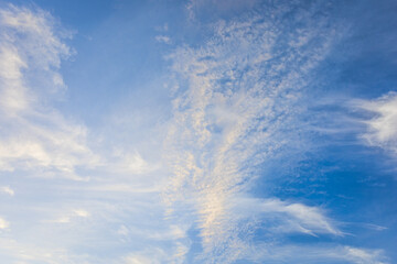 Naklejka na ściany i meble Clouds in the blue sky. Environment, atmosphere.