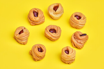 Turkish baklava with peanuts on a yellow background