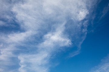 Blue sky with white clouds beautiful background.