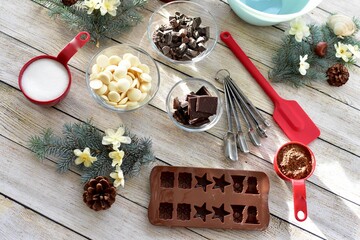 Festive holiday ingredients for making delicious candy and treats for Christmas season gifts and chocolates for family and friends