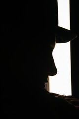 Silhouette of a young woman