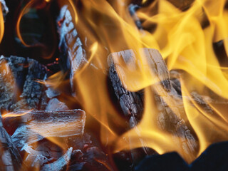 close up of burning wood and charcoal