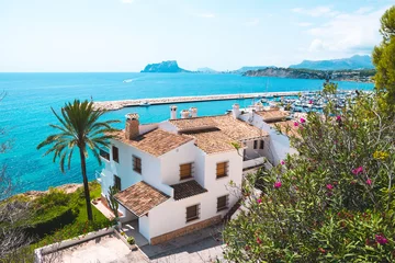 Wall murals Mediterranean Europe Traditional white houses with unspoilt idyllic view of marina, coastline and Mediterranean Sea in Moraira, Costa Blanca, Spain