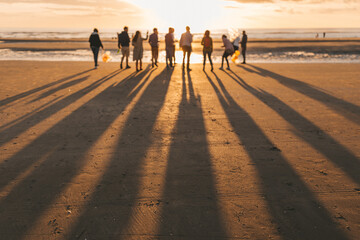 holiday on the sandy beach at sunset