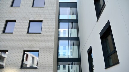 Modern European residential apartment buildings quarter. Abstract architecture, fragment of modern urban geometry.