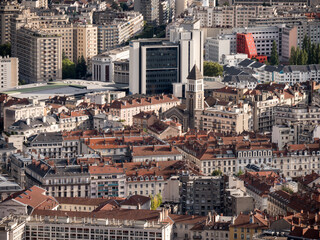 Fototapeta premium View on the roofs of the old town in Grenoble. The city is the prefecture and largest city of the Isère department in the Auvergne-Rhône-Alpes region of Southeastern France.