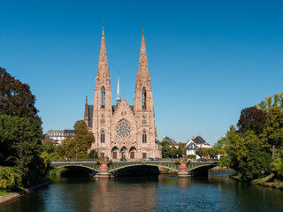 Fototapeta na wymiar The St. Paul's Church of Strasbourg (French: Église réformée Saint-Paul) is one of the landmarks of the city of Strasbourg, in Alsace, France. Blue sky, sunny day.