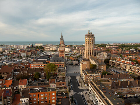 Cityscape of Dunkirk. View on the city and the town hall from the St Eloi belfry. Some clouds in the sky. 