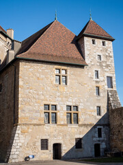 Fototapeta na wymiar View on the Château d'Annecy (Annecy castle), a restored castle which dominates the old French town of Annecy in the Haute-Savoie département. Sunny day and blue sky.
