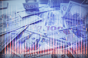 Multi exposure of forex chart drawing over us dollars bill background. Concept of financial success markets.