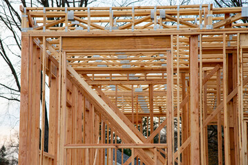 Wood framing on new house under construction view