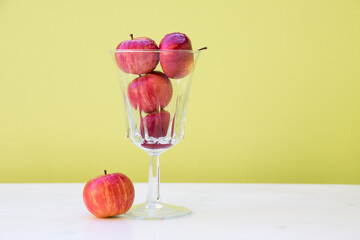 Apples in a glass. Concept of apple as a sip of health