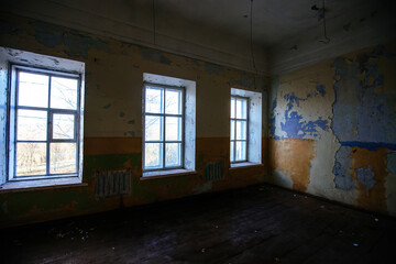 Interior of messy dirty room at old abandoned building